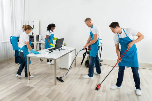 Janitors cleaning an office